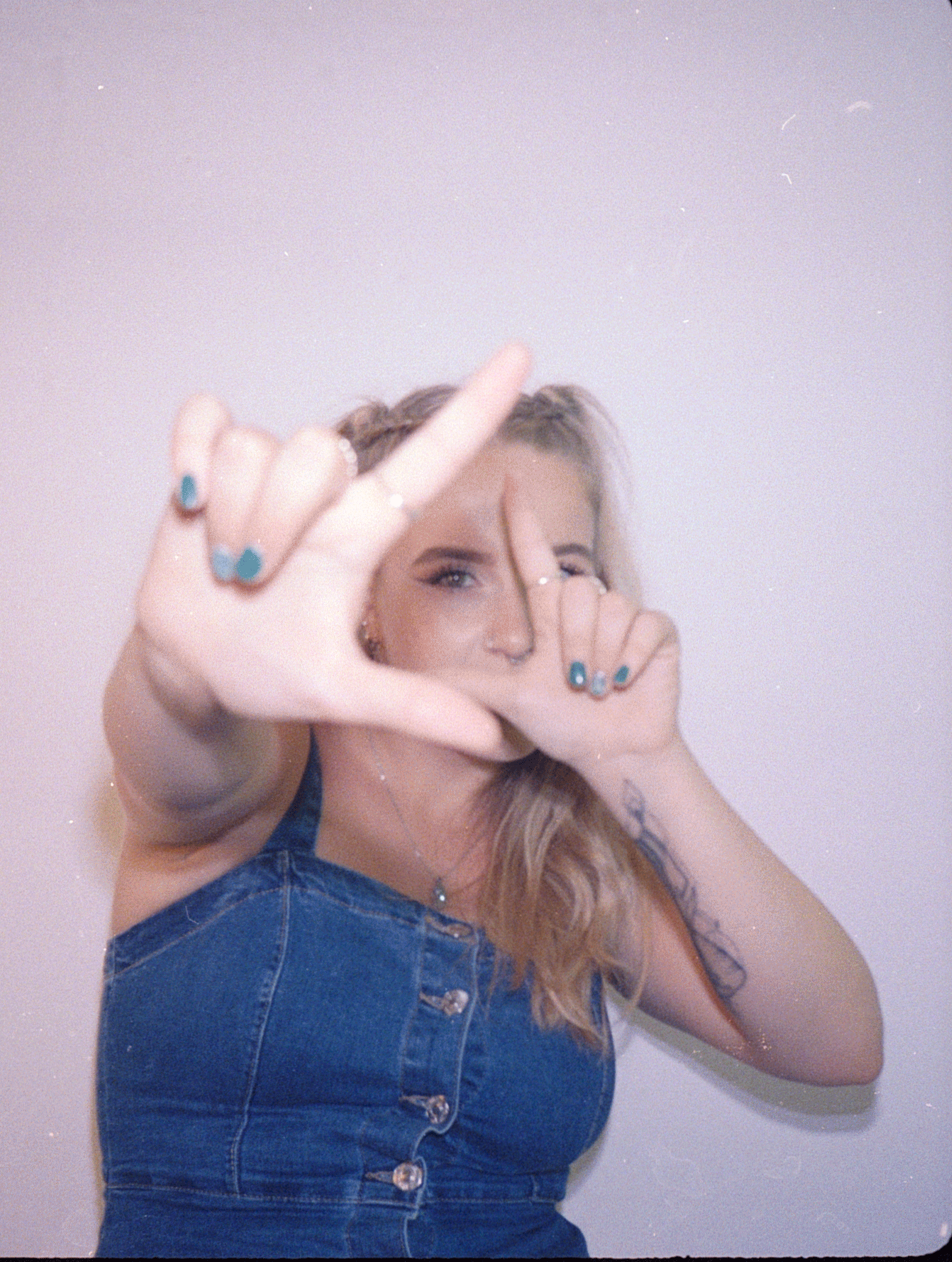 Photoshoot with musician Rhiannon Paige. Social media assets. This was created from stitching together 35mm film stills and converting the image into a gif using PS.