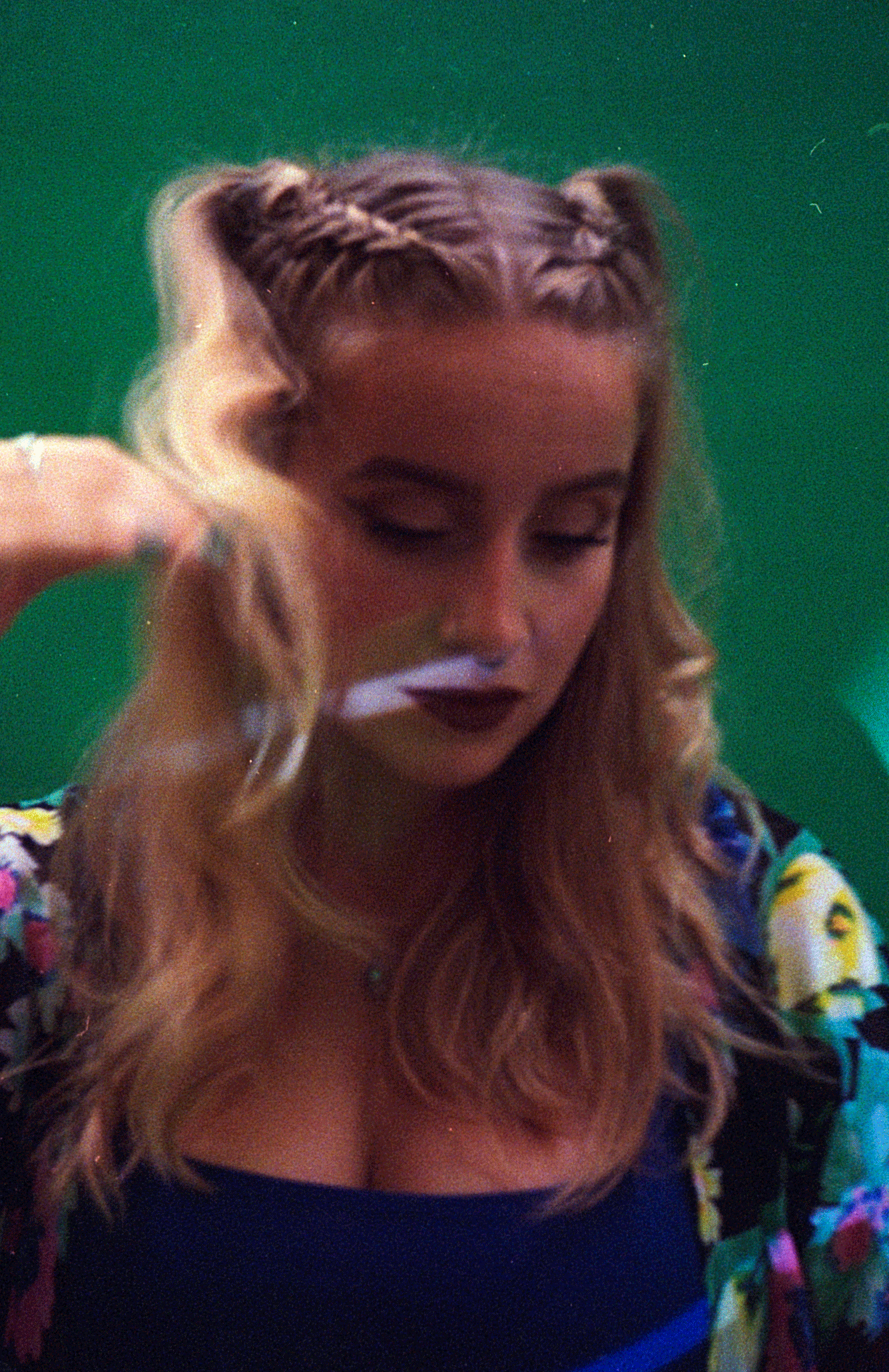 Photoshoot with musician Rhiannon Paige. Social media assets. This was created from stitching together 35mm film stills and converting the image into a gif using PS.